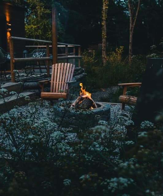 Cosy fire pit area at dusk